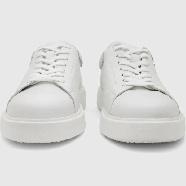 White Canvas Slip-ons