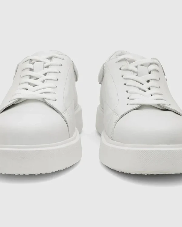 White Canvas Slip-ons
